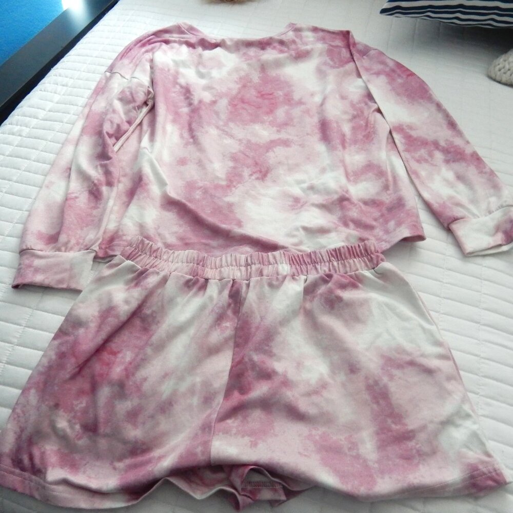 pink and white short and top lounge set